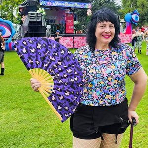 Stay Cool and Stylish with Harlem Starlet’s Bamboo Hand Fans for Summer Festivals and Pride Events